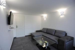Posezení v ubytování T2 cosy entre calme et proximité