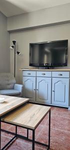 Sjónvarps- og/eða afþreyingartæki á Apartaments Bonet
