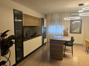 Kuchyň nebo kuchyňský kout v ubytování B&B A Casa Mia