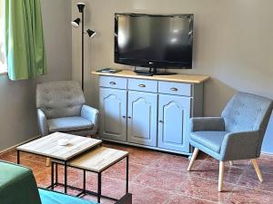 Sjónvarps- og/eða afþreyingartæki á Apartaments Bonet