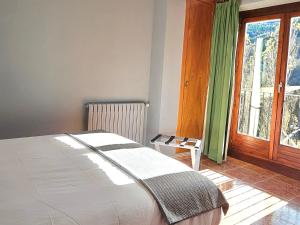 Rúm í herbergi á Apartaments Bonet
