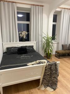 Postel nebo postele na pokoji v ubytování Apartmán Tržnice