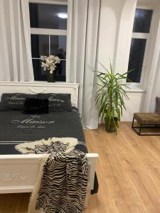 Postel nebo postele na pokoji v ubytování Apartmán Tržnice