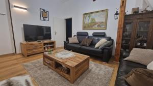 TV a/nebo společenská místnost v ubytování Gemütliche 2 Raum Wohnung