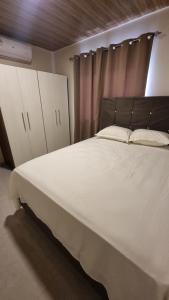 Postel nebo postele na pokoji v ubytování Casa a estrenar