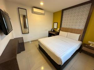 TV a/nebo společenská místnost v ubytování South of The Clouds HOTEL KL Sentral 吉隆坡彩云之南酒店-中央车站店