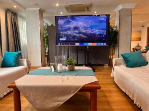 Telewizja i/lub zestaw kina domowego w obiekcie Hotel Selva Arenal