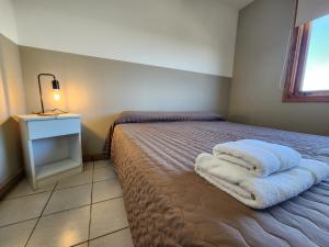 Cama ou camas em um quarto em YAGHAN HOSTEL