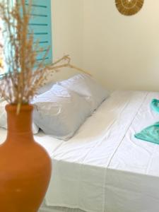 Postel nebo postele na pokoji v ubytování Amaly Pousada e Bistrô