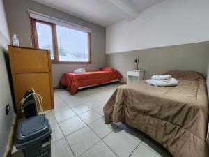 Cama ou camas em um quarto em YAGHAN HOSTEL
