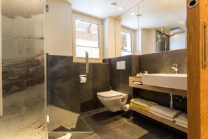 Ein Badezimmer in der Unterkunft Hotel Kirchenwirt