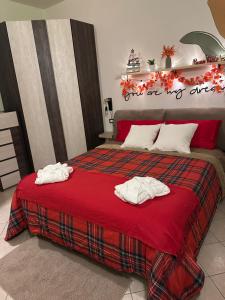 Letto o letti in una camera di Mariella sul borgo