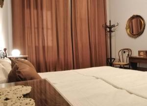 Voodi või voodid majutusasutuse Šomin lagum - Guest house toas