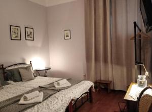 Voodi või voodid majutusasutuse Šomin lagum - Guest house toas