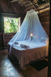 Posteľ alebo postele v izbe v ubytovaní Bungalows India, El Valle, Samana