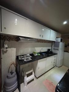 Η κουζίνα ή μικρή κουζίνα στο Maragogi Beach Flats