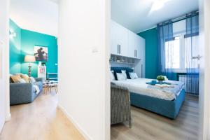 En eller flere senge i et værelse på CasaViva - Good Vibe Bilo in Camogli with Shared Pool + 13 billeder