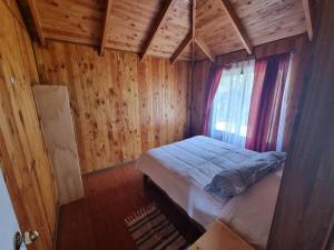 Кровать или кровати в номере Casa ñancul, villarrica