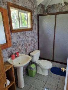 Ванная комната в Casa ñancul, villarrica +4 фотографии