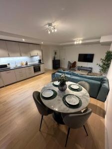 Kuchyň nebo kuchyňský kout v ubytování Central City Apartment B