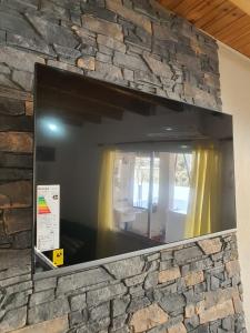 TV a/nebo společenská místnost v ubytování Vino al Valle