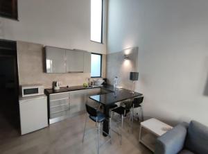 Η κουζίνα ή μικρή κουζίνα στο Typical house Faro downtown private entrance +28 φωτογραφίες