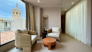 Posezení v ubytování Cosy Rooms Tapinería