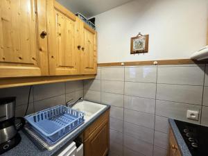 Kuchyň nebo kuchyňský kout v ubytování Résidence Les Melezes - Appartement spacieux · Vue dégagée sur la montagne · Balcon Ouest MAE-0404 + 13 fotografií