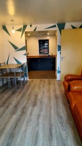 a living room with a couch and a table at City Bliss Great Location in Birmingham