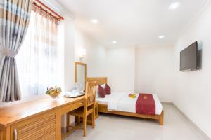 TV a/nebo společenská místnost v ubytování Thien Hai Hotel