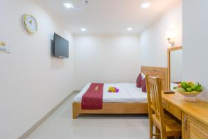 Postel nebo postele na pokoji v ubytování Thien Hai Hotel