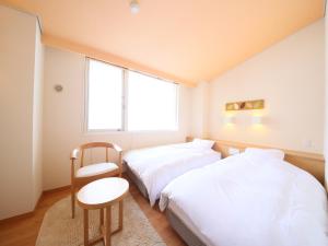 Postel nebo postele na pokoji v ubytování Manza Juraku All-inclusive Hotel + 31 fotografií