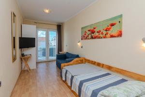 Posteľ alebo postele v izbe v ubytovaní Apartments with parking spaces Vir - 18517