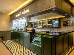 Photo de la galerie de l'établissement City Comfort Premier Hotel Xiong County Baiyangdian High-speed Railway Station, à Baoding