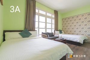 Postel nebo postele na pokoji v ubytování Janice's Inn