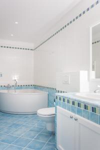 Koupelna v ubytování OCEAN APARTMENT by DuHomes + 17 fotografií