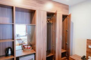 Kuchyň nebo kuchyňský kout v ubytování Hotel A89 Rosarian
