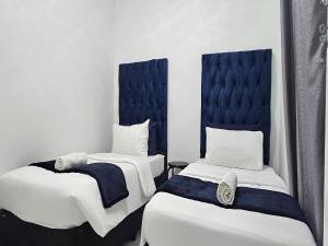 Ένα ή περισσότερα κρεβάτια σε δωμάτιο στο Goshen Lodge Fitzroy +273 φωτογραφίες