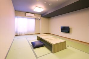大江戸温泉物語 Premium あたみにあるテレビまたはエンターテインメントセンター