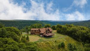 an aerial view of a house on a hill at Chester by AvantStay Amazing Views Secluded Home A True City Escape in Austerlitz