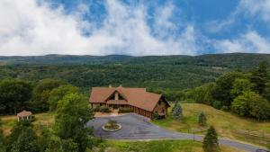 an aerial view of a house with mountains in the background at Chester by AvantStay Amazing Views Secluded Home A True City Escape in Austerlitz