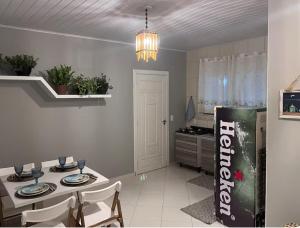 Kuchyň nebo kuchyňský kout v ubytování Apartamento Guarda do Embaú