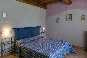 Katil atau katil-katil dalam bilik di Agriturismo Valdo