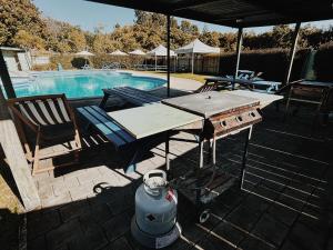 Bazén v ubytování Welcome Bay Hot Pools nebo v jeho okolí