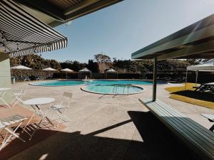 Bazén v ubytování Welcome Bay Hot Pools nebo v jeho okolí