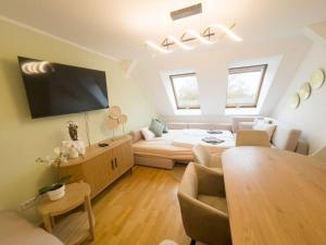 TV in/ali zabaviščno središče v nastanitvi CASARiNA - Über den Dächern Leipzigs