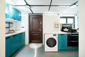 Una cocina o zona de cocina en Tonight Aparthotel West Nanjing Road Shanghai
