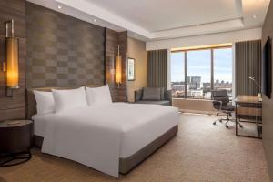 Dusit Princess Melaka客房内的一张或多张床位