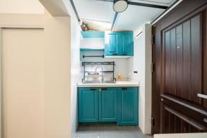 Una cocina o zona de cocina en Tonight Aparthotel West Nanjing Road Shanghai