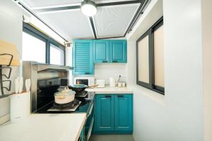 Una cocina o zona de cocina en Tonight Aparthotel West Nanjing Road Shanghai